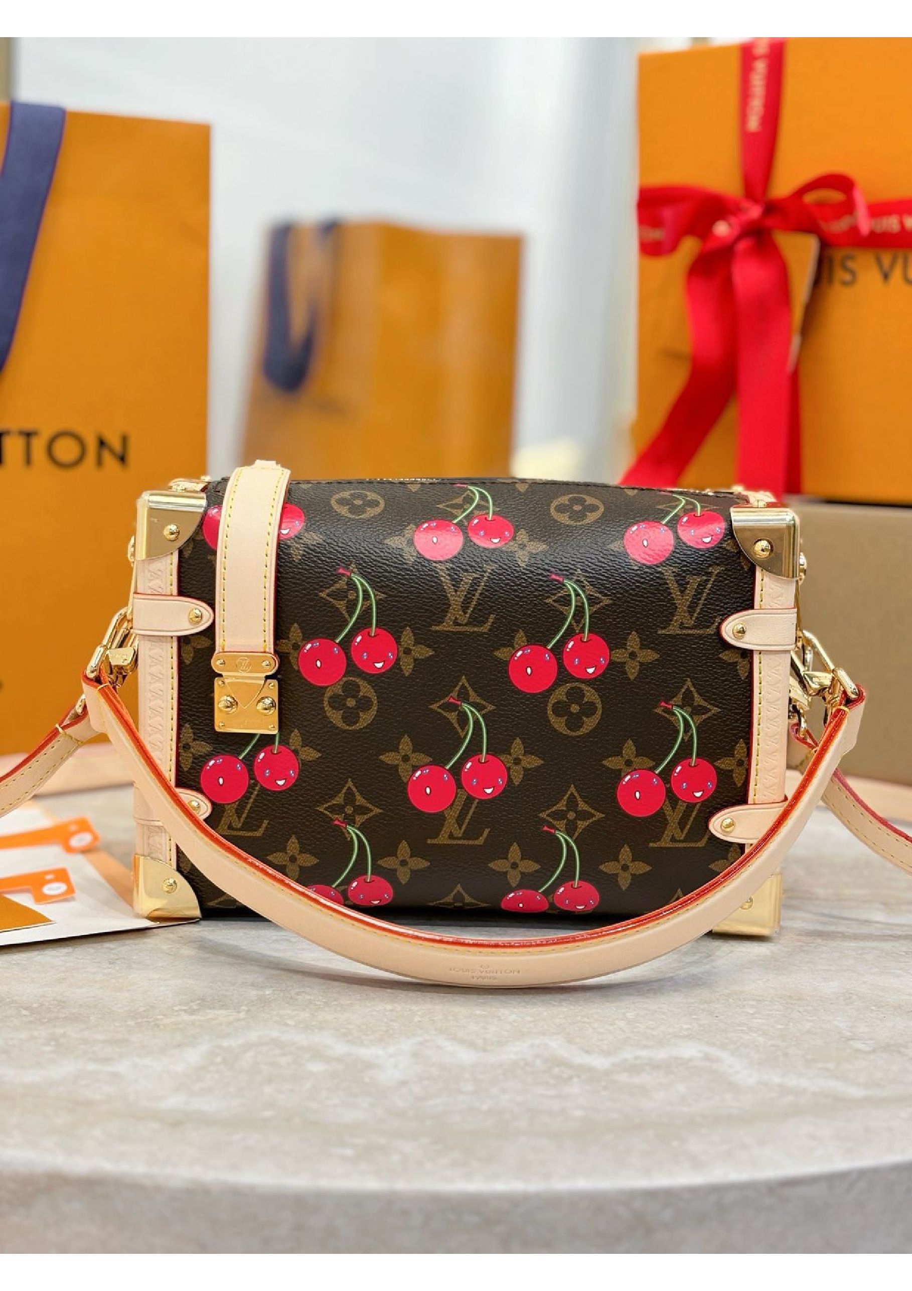 Louis Vuitton denim cherry bag