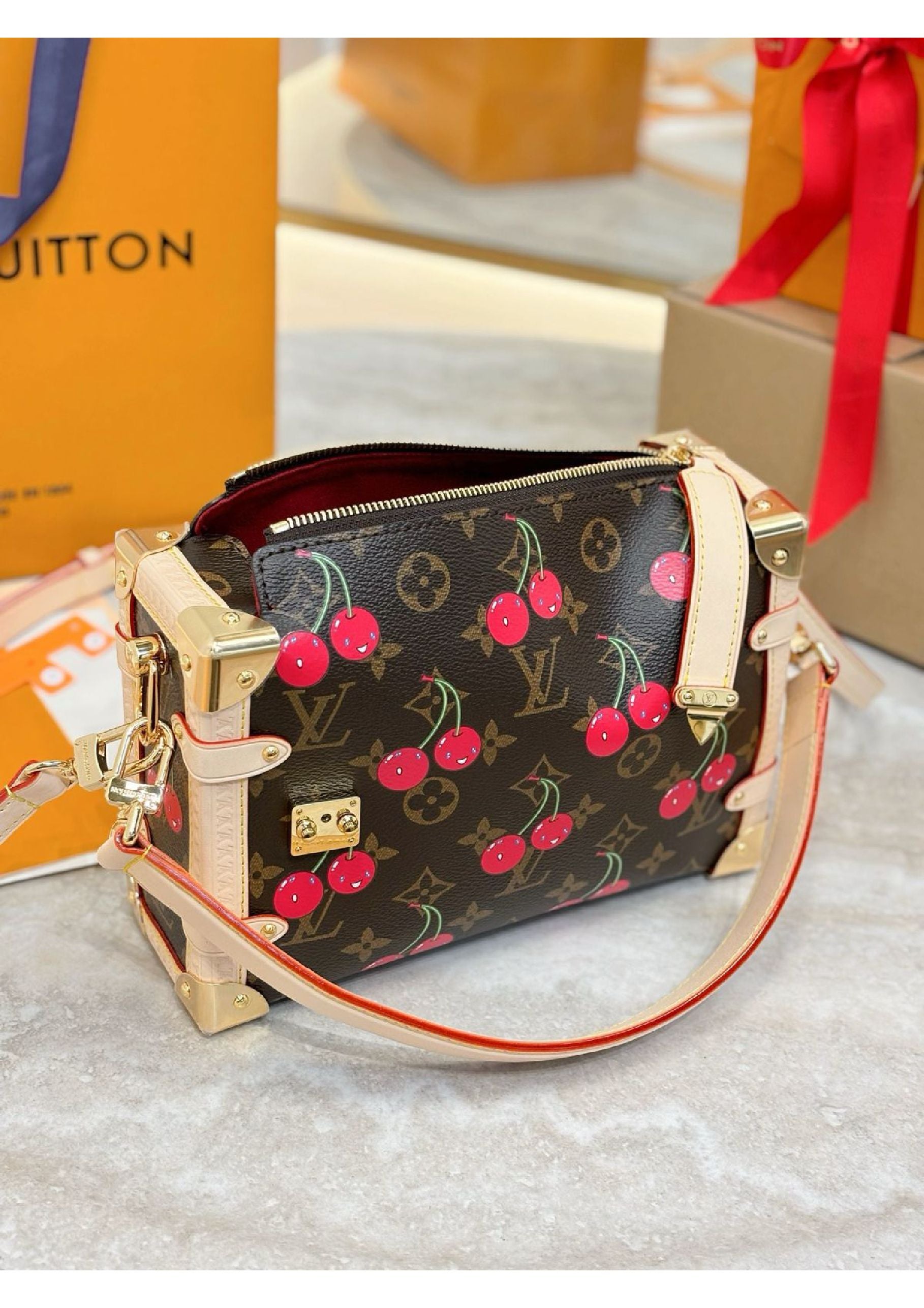 Louis Vuitton denim cherry bag