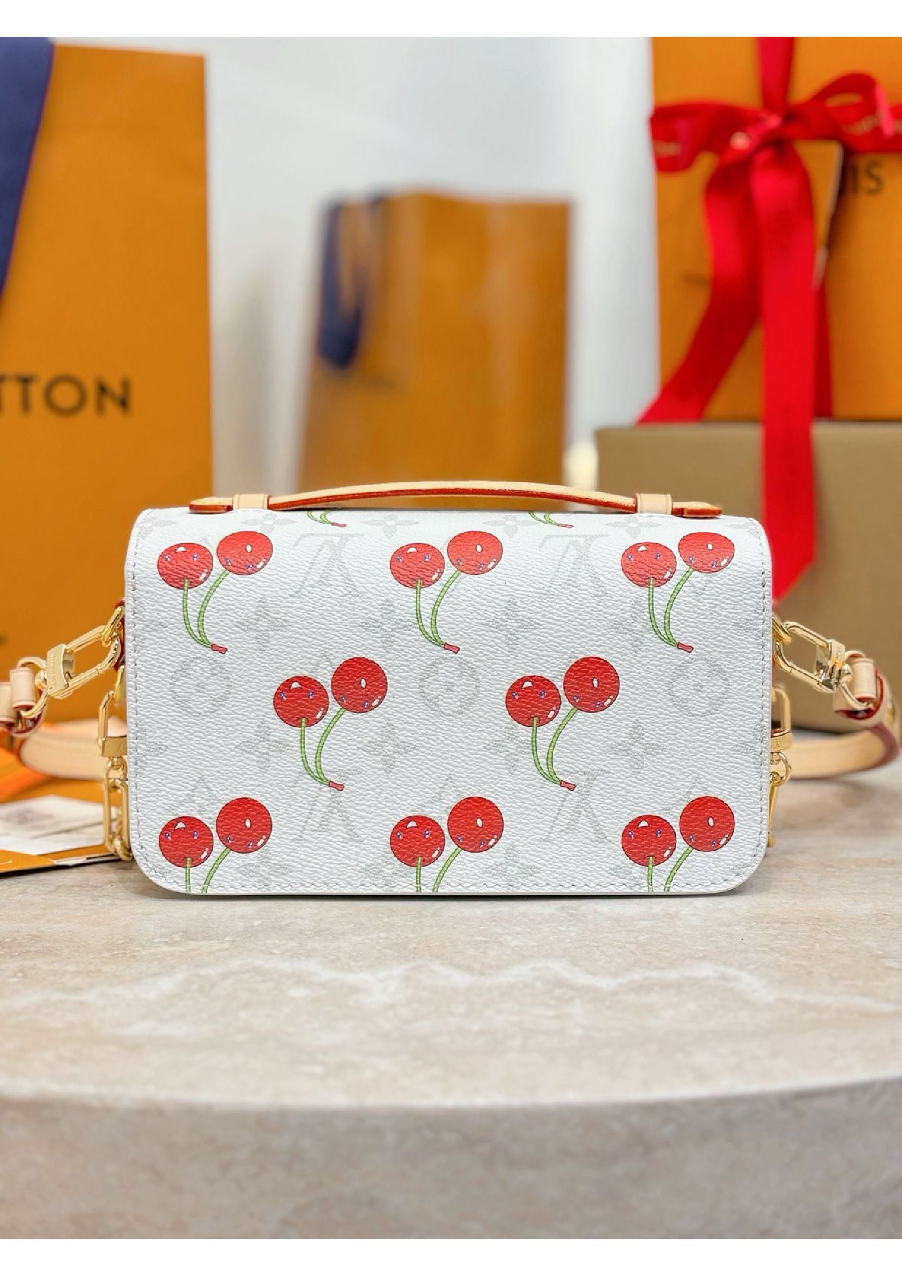 Louis Vuitton denim cherry bag