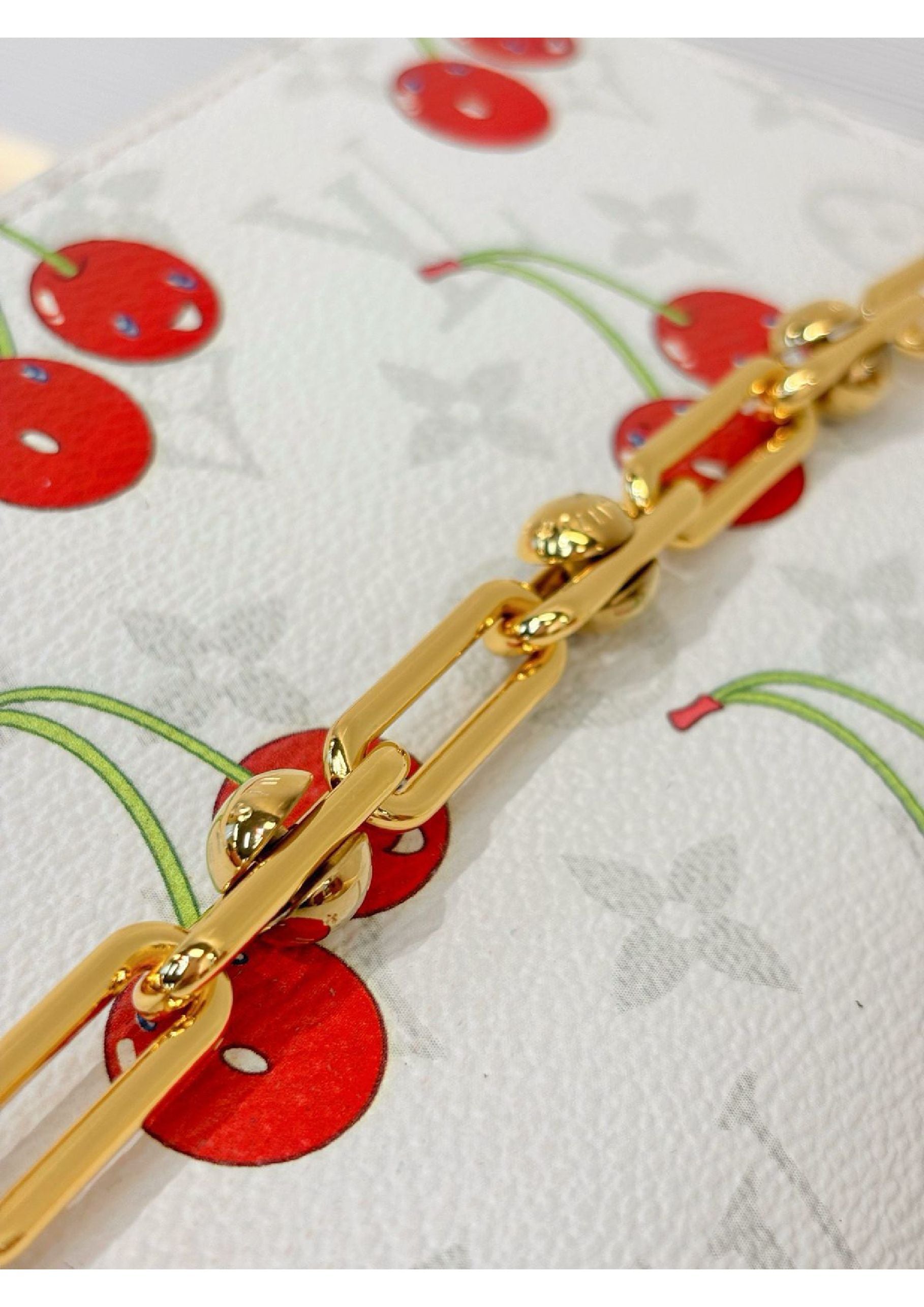 Louis Vuitton denim cherry bag