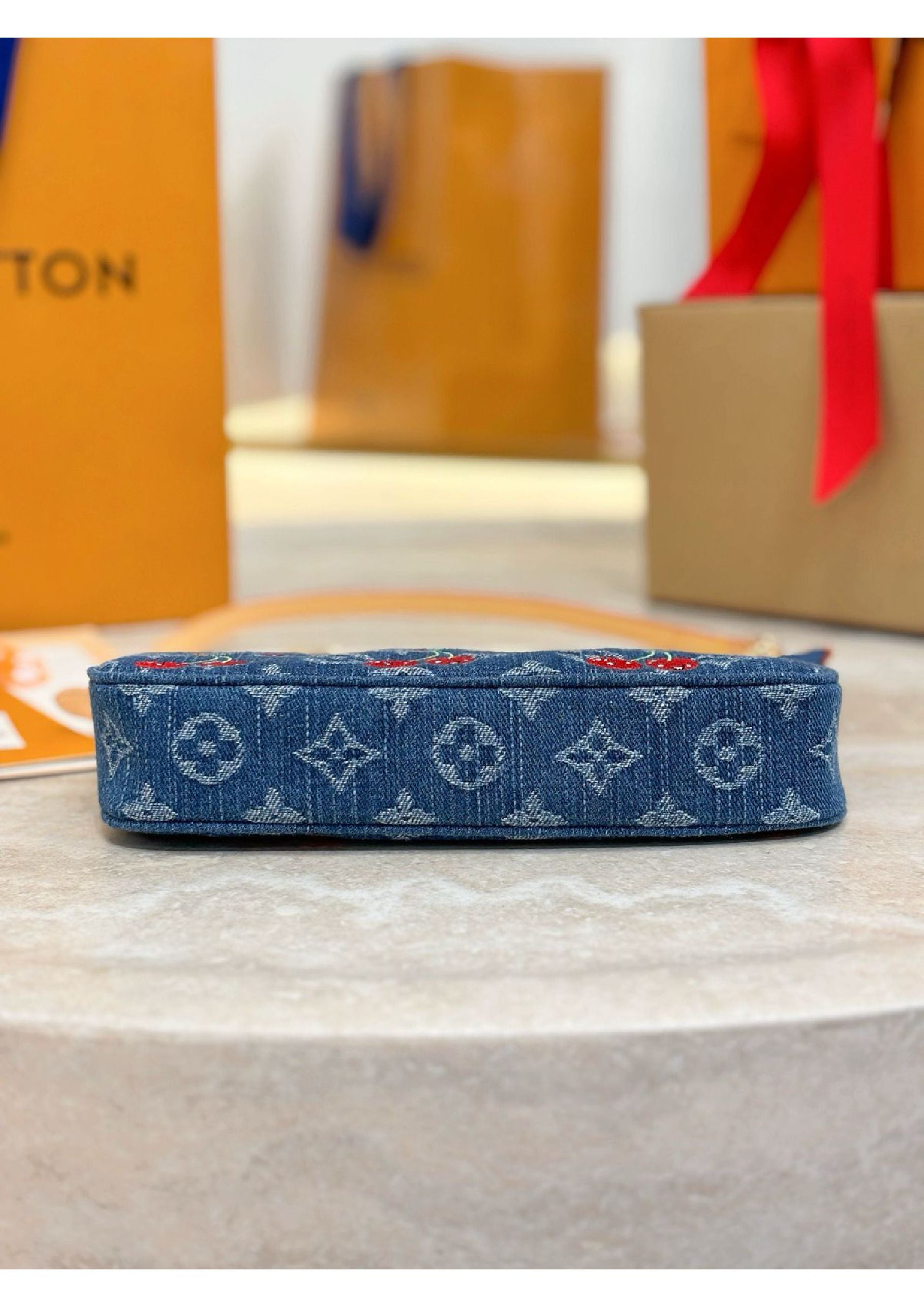 Louis Vuitton denim cherry bag