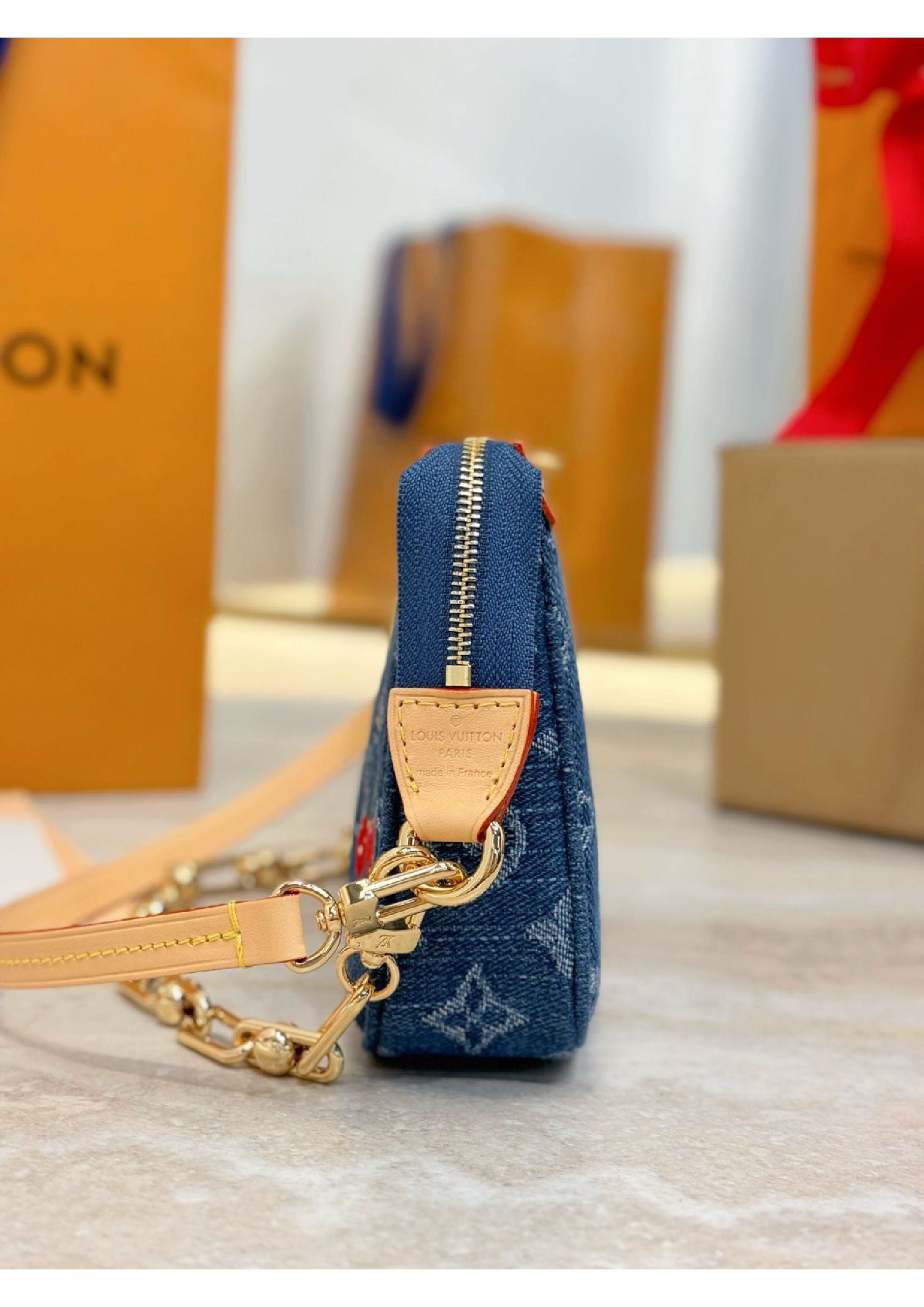 Louis Vuitton denim cherry bag